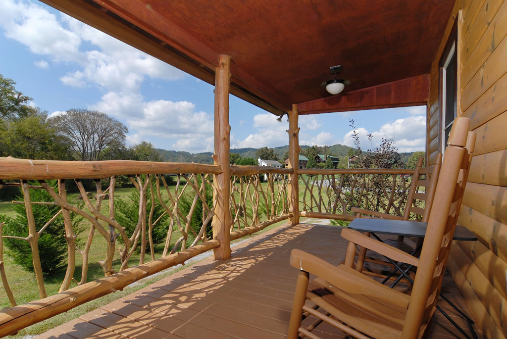 Pigeon Forge Cabin that has rocking chars overlooking a private setting